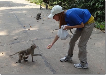 Laura B feeding monkeys 2